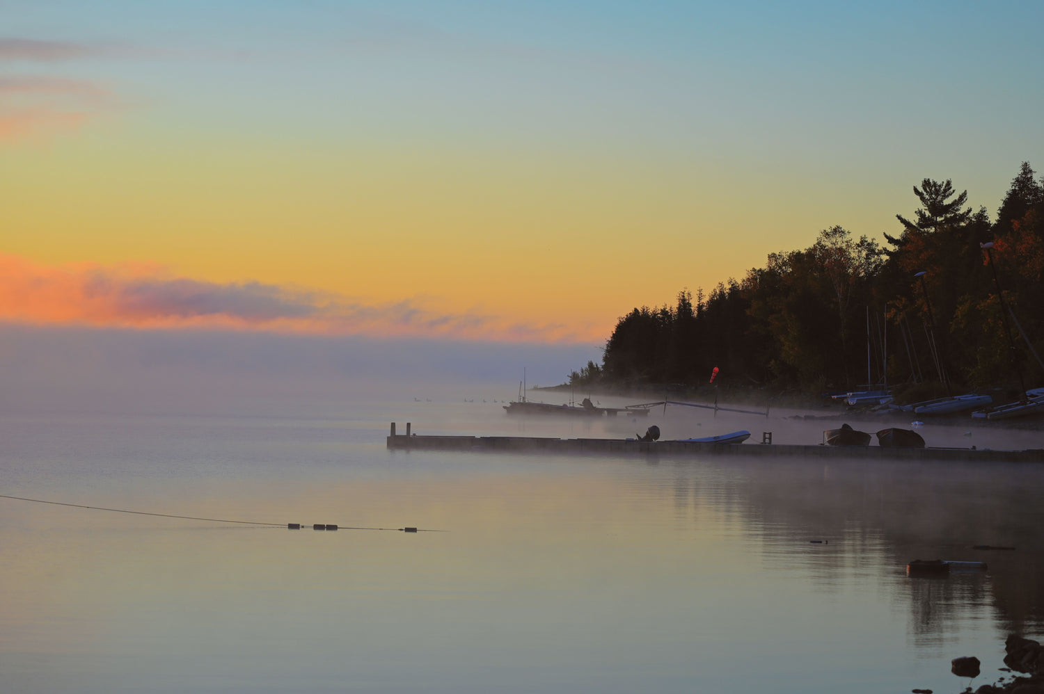 A view at the ORCC dock in early morning with the river covered in fog - simply beautiful.